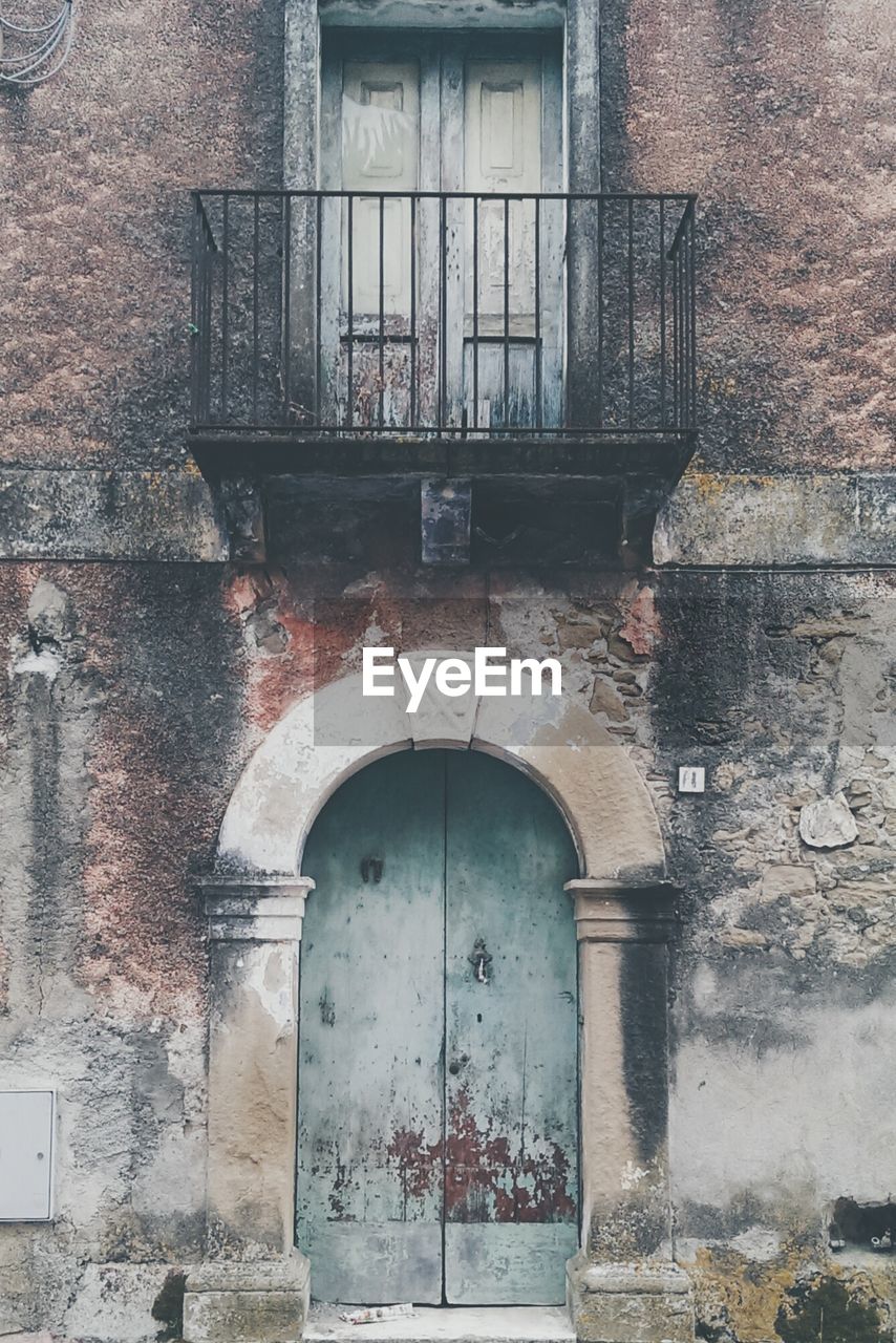 Entrance and balcony of old building