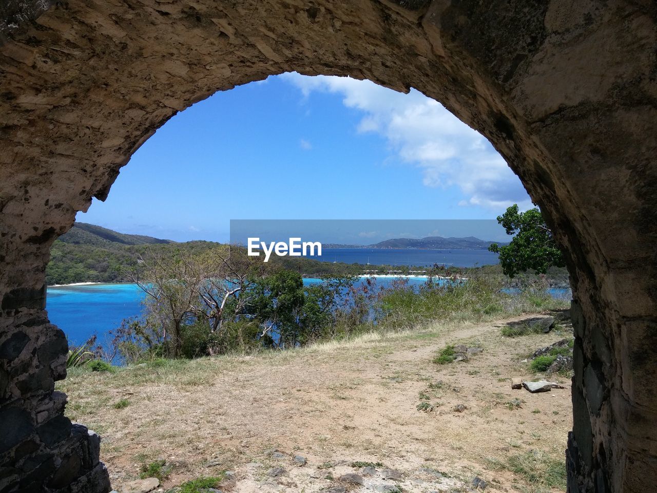 View of sea through arch