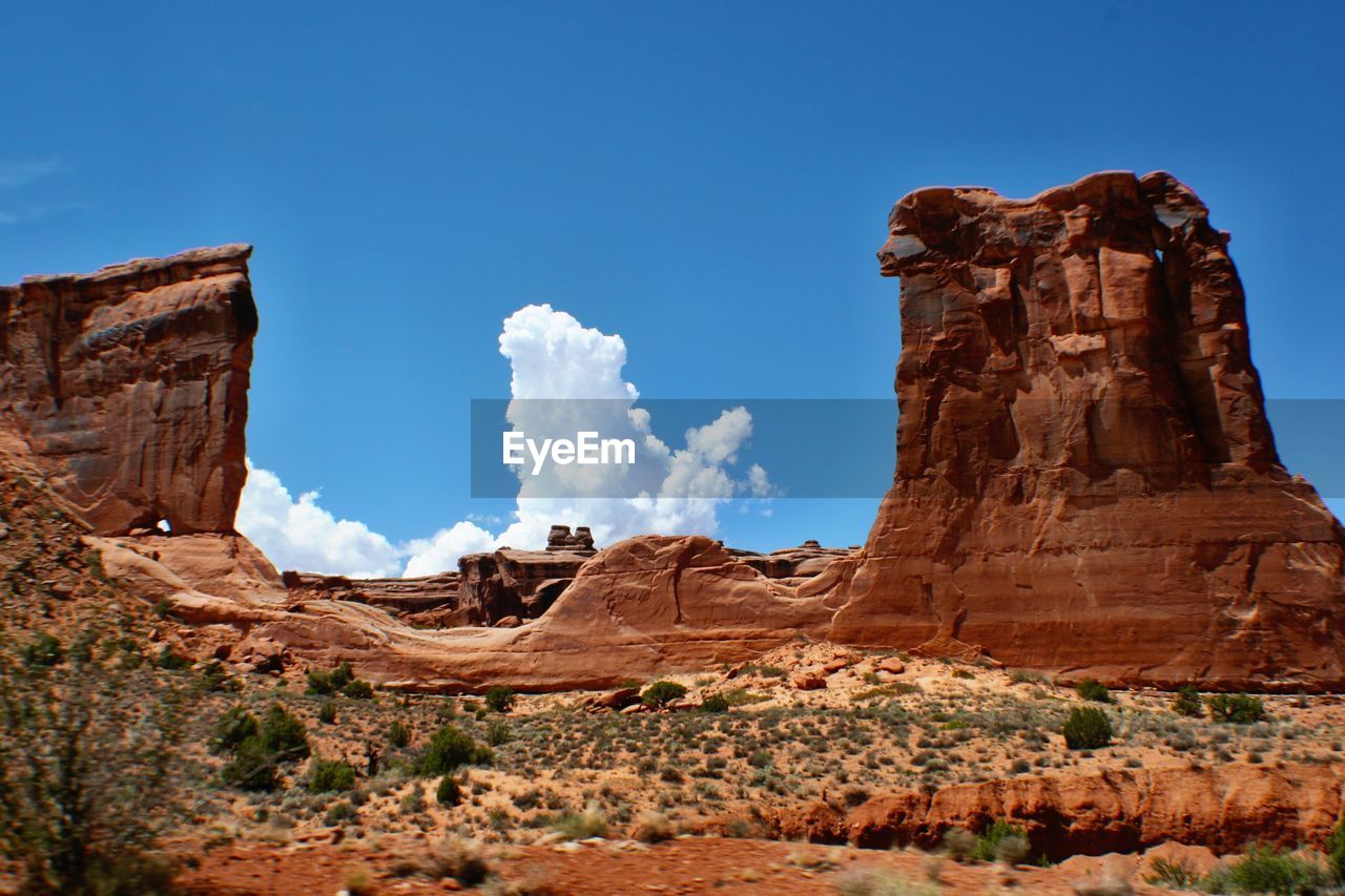 Low angle view of rocky mountains at arches national park