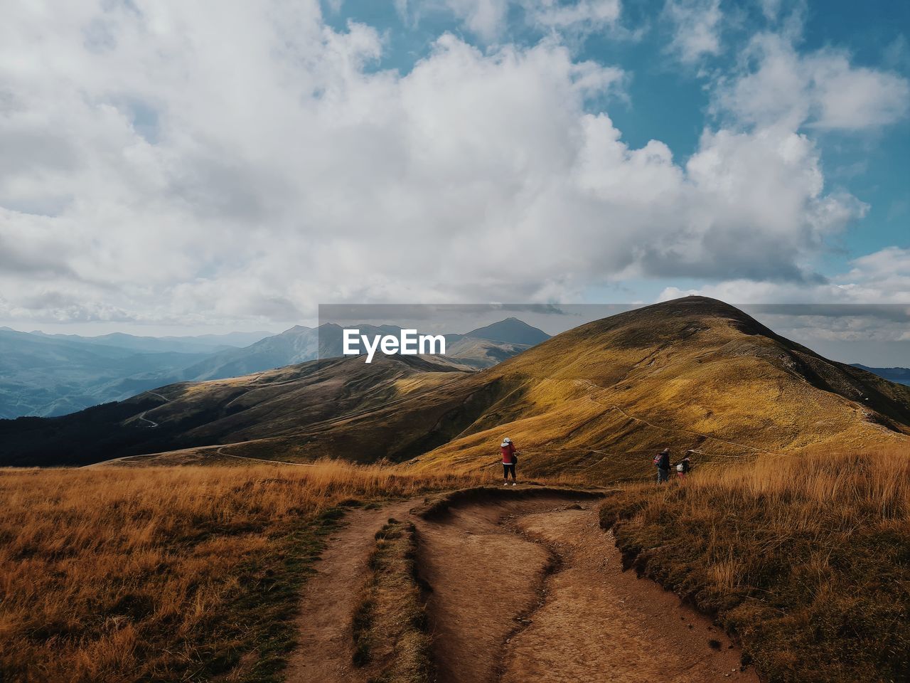 Scenic view of mountain road against sky