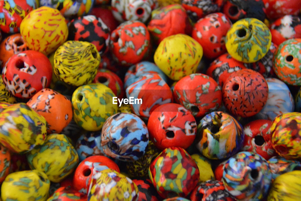 multi colored, easter egg, large group of objects, tradition, food, holiday, no people, easter, celebration, full frame, variation, backgrounds, abundance, market, egg, craft, close-up, creativity, retail, vibrant color, food and drink, pattern, paint, still life, outdoors, decoration, toy