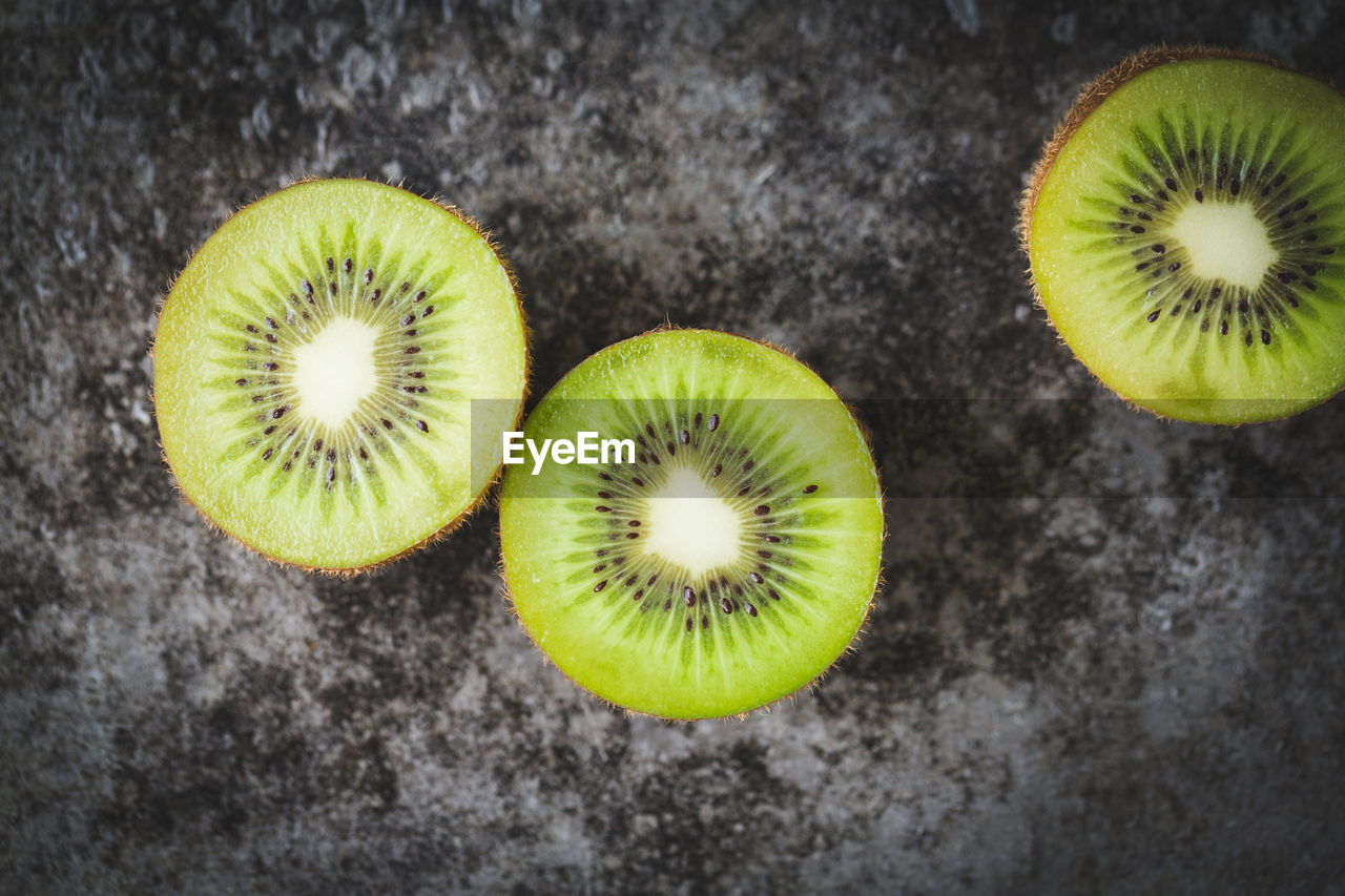 Fresh kiwis on table