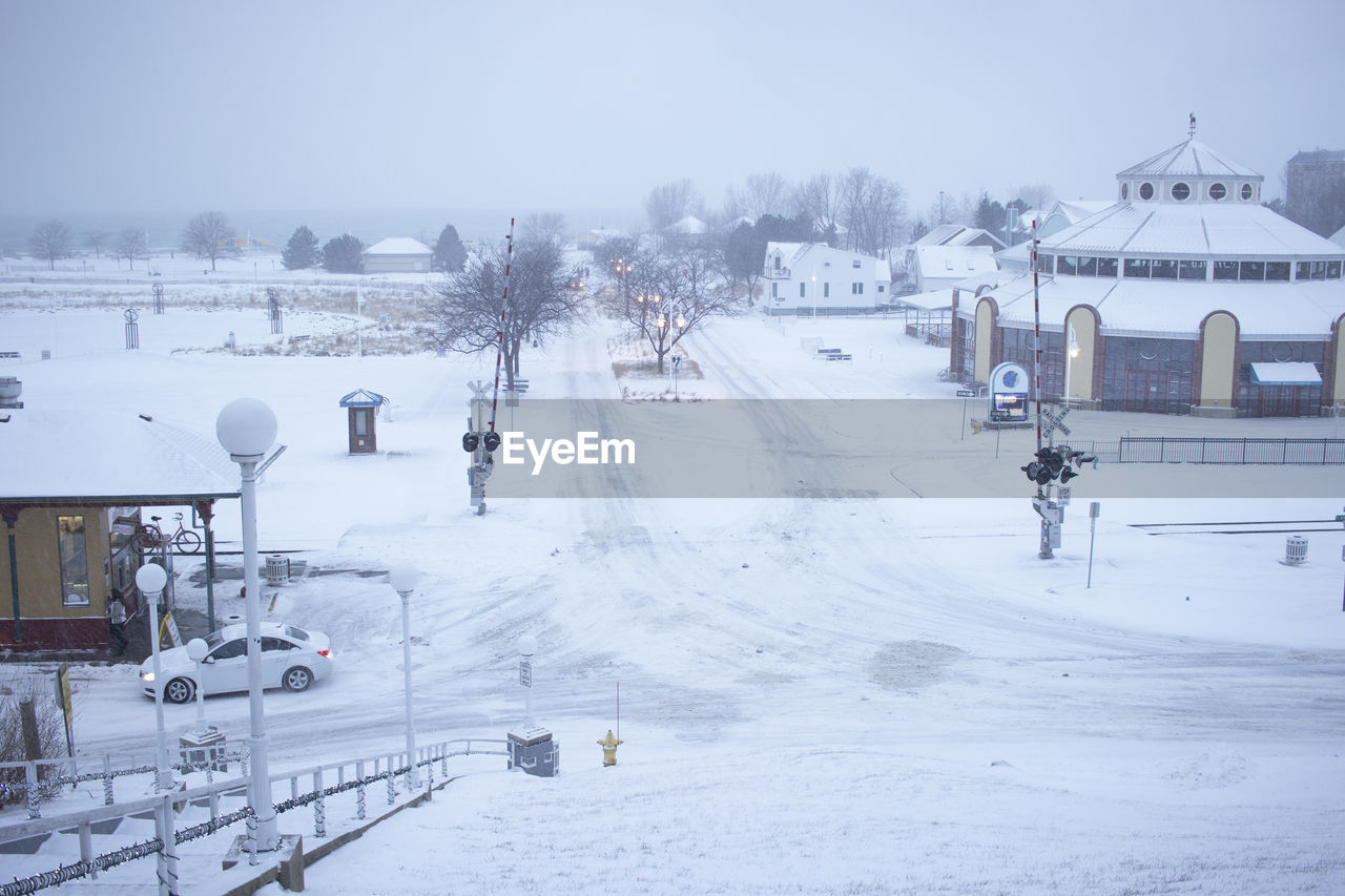 SNOW COVERED LANDSCAPE AND BUILDINGS