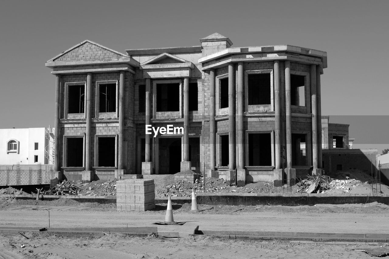 OLD BUILDING AGAINST SKY