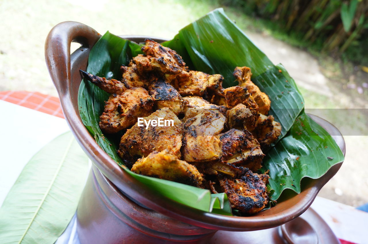 High angle view of cooked chicken meat in container