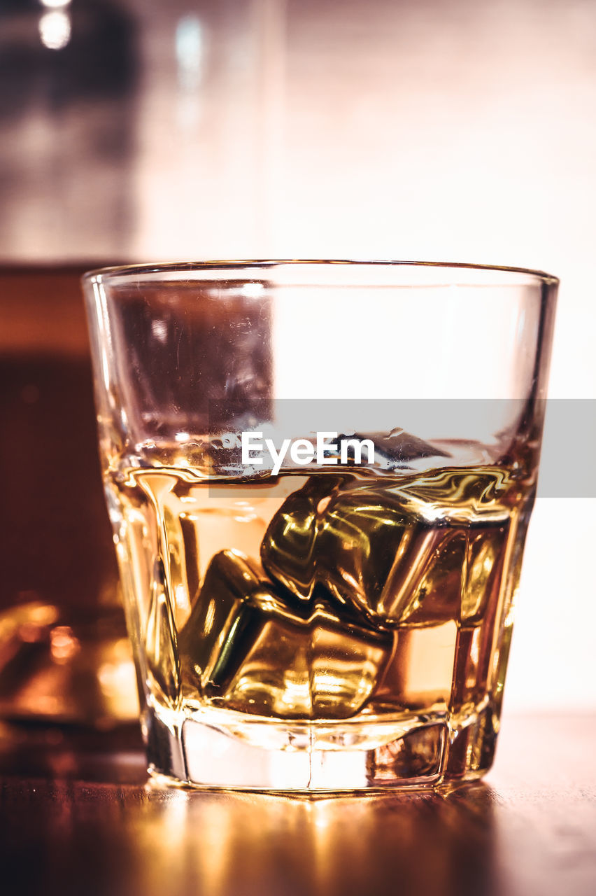 CLOSE-UP OF ICE TEA ON TABLE