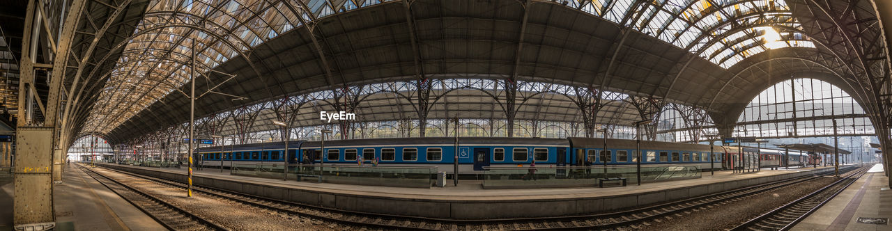 TRAIN AT RAILROAD STATION PLATFORM