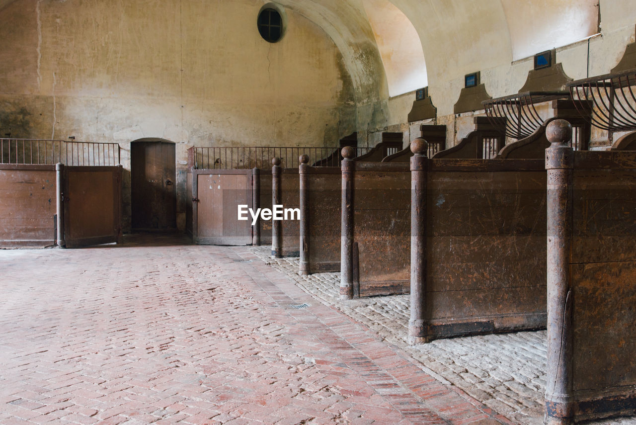 architecture, ancient history, history, built structure, the past, wall, building, no people, old, indoors, abandoned, wall - building feature, arch, ancient, wood, day, entrance