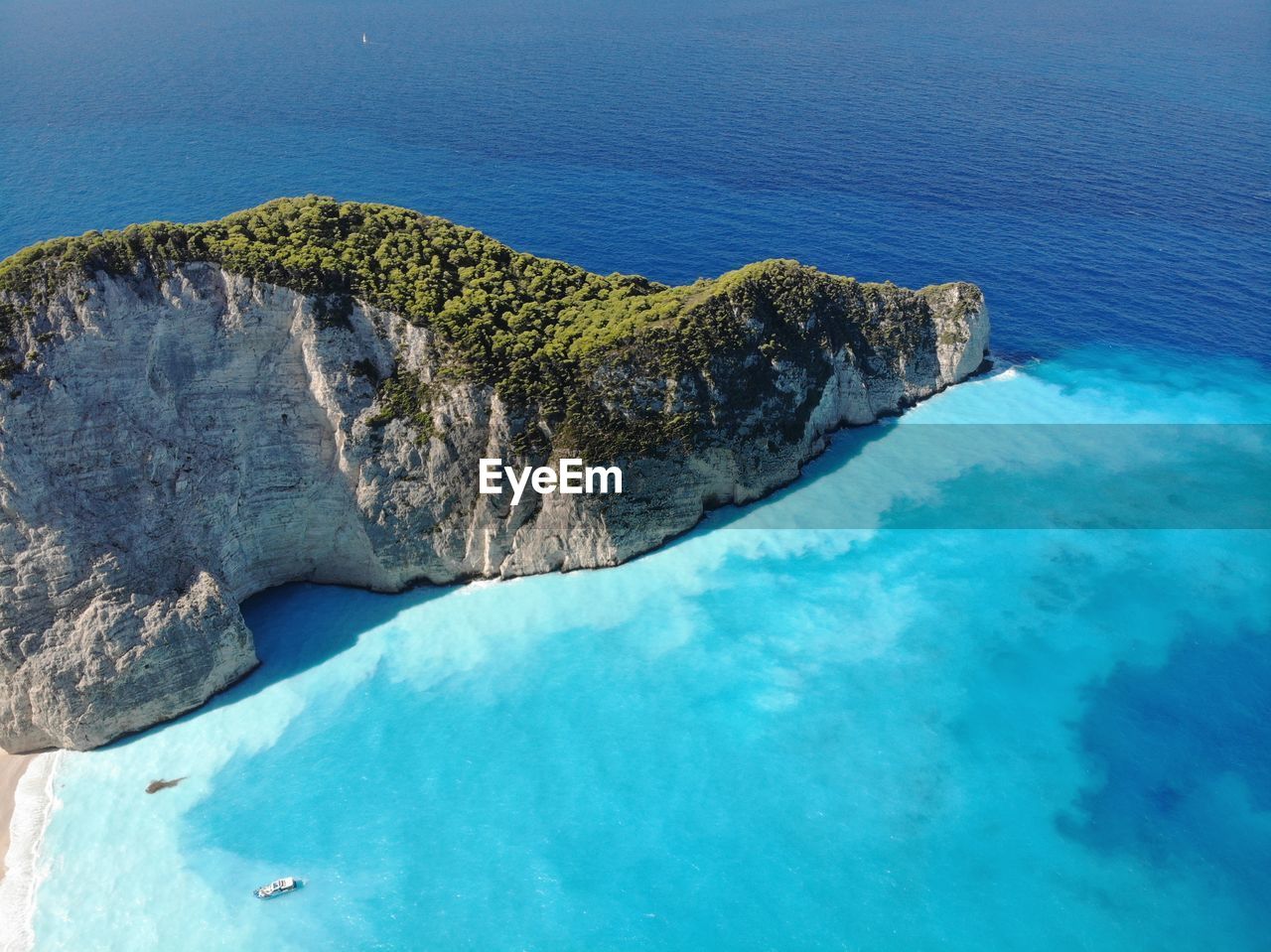 High angle view of rocks in sea