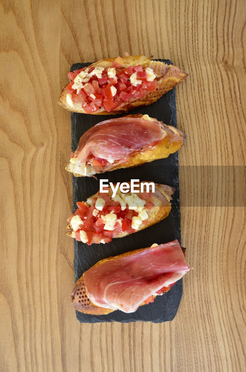 Directly above shot of food served on table