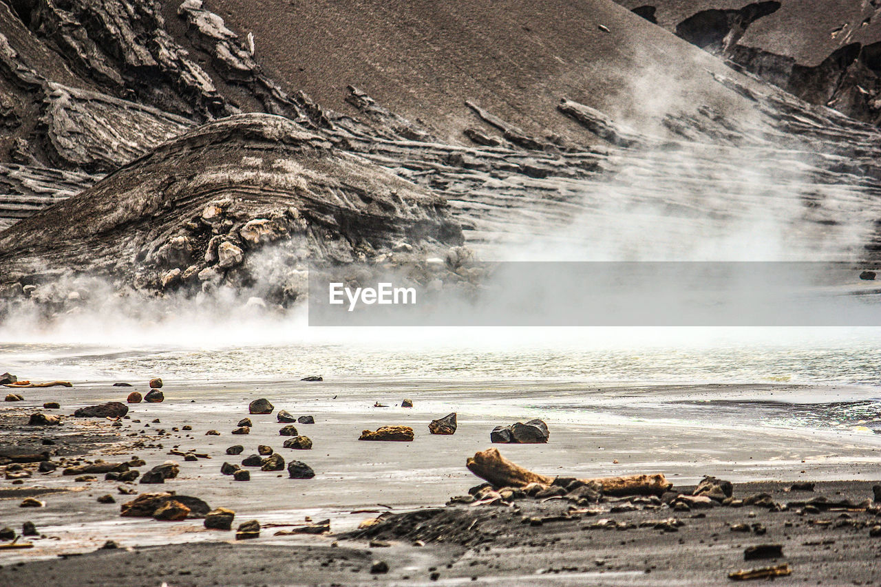 Scenic view of sea and mountain