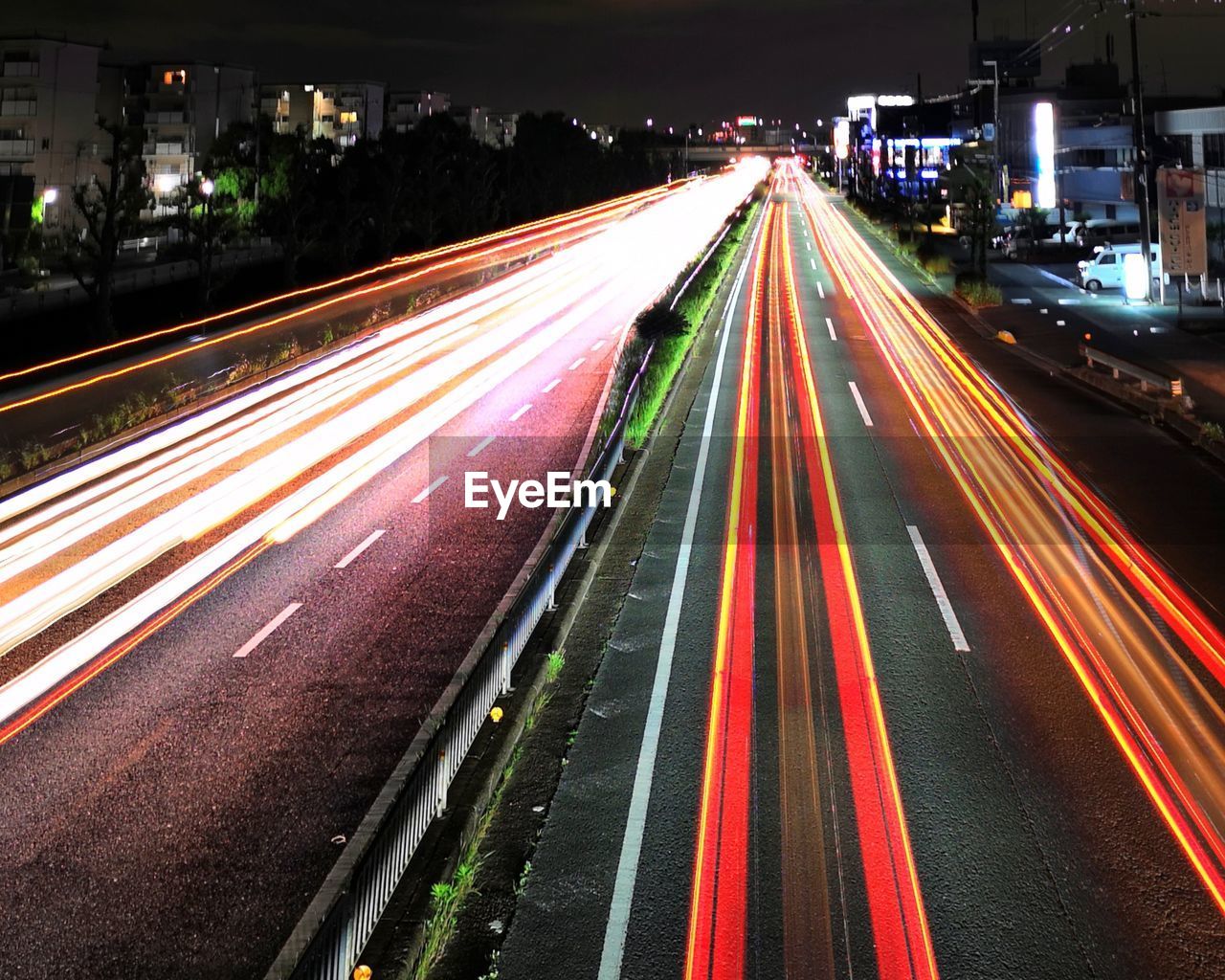 High angle view of light trails on city street