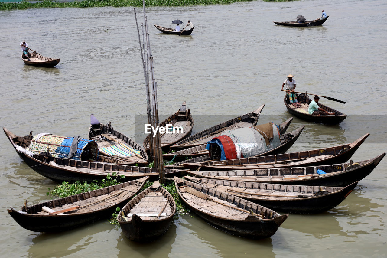 nautical vessel, transportation, mode of transportation, water, boat, gondola, vehicle, boating, travel, nature, watercraft, day, canal, moored, tradition, outdoors, travel destinations, occupation, tourism, canoe, high angle view, sea, no people, long-tail boat, architecture