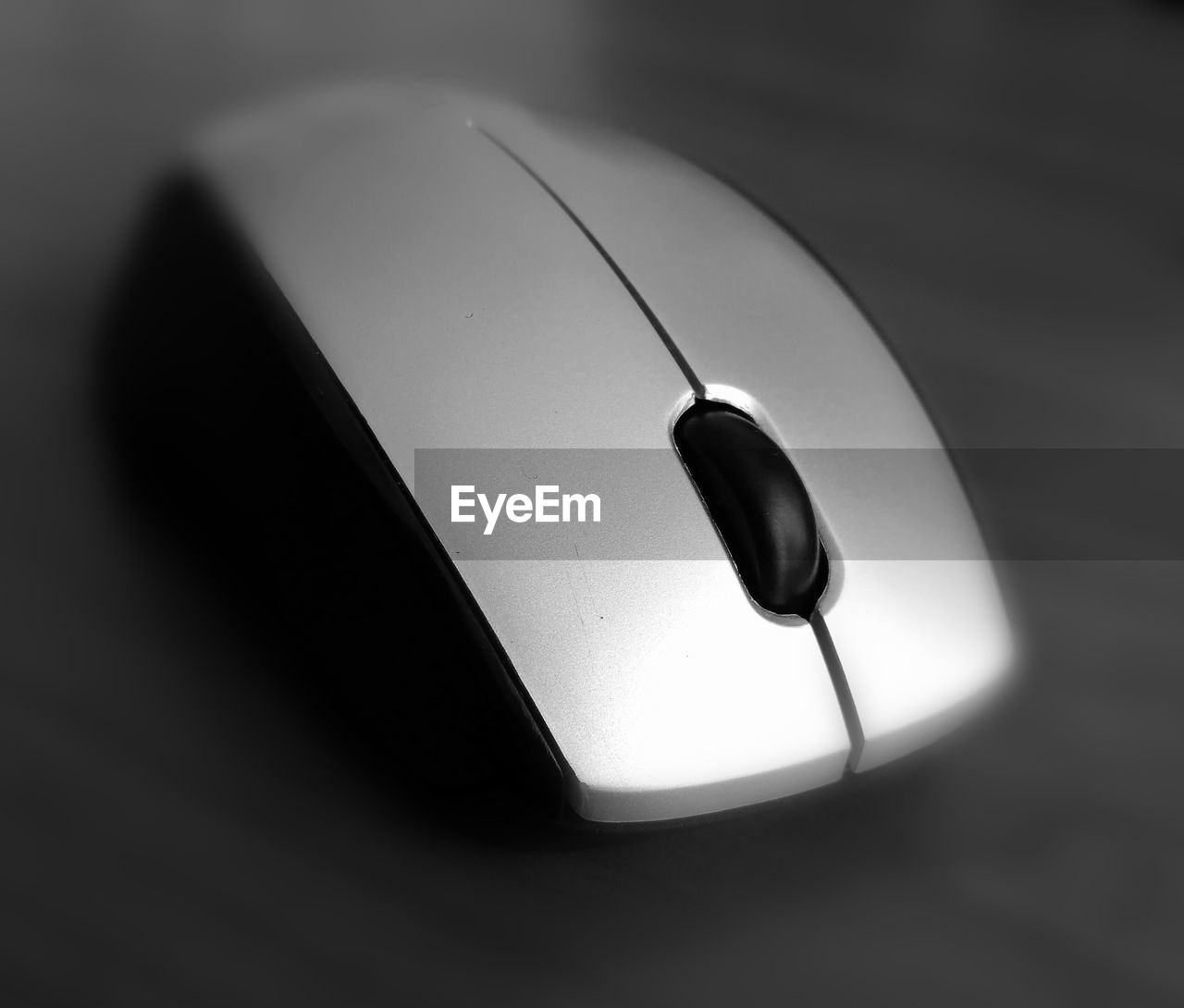 Close-up of computer mouse on table