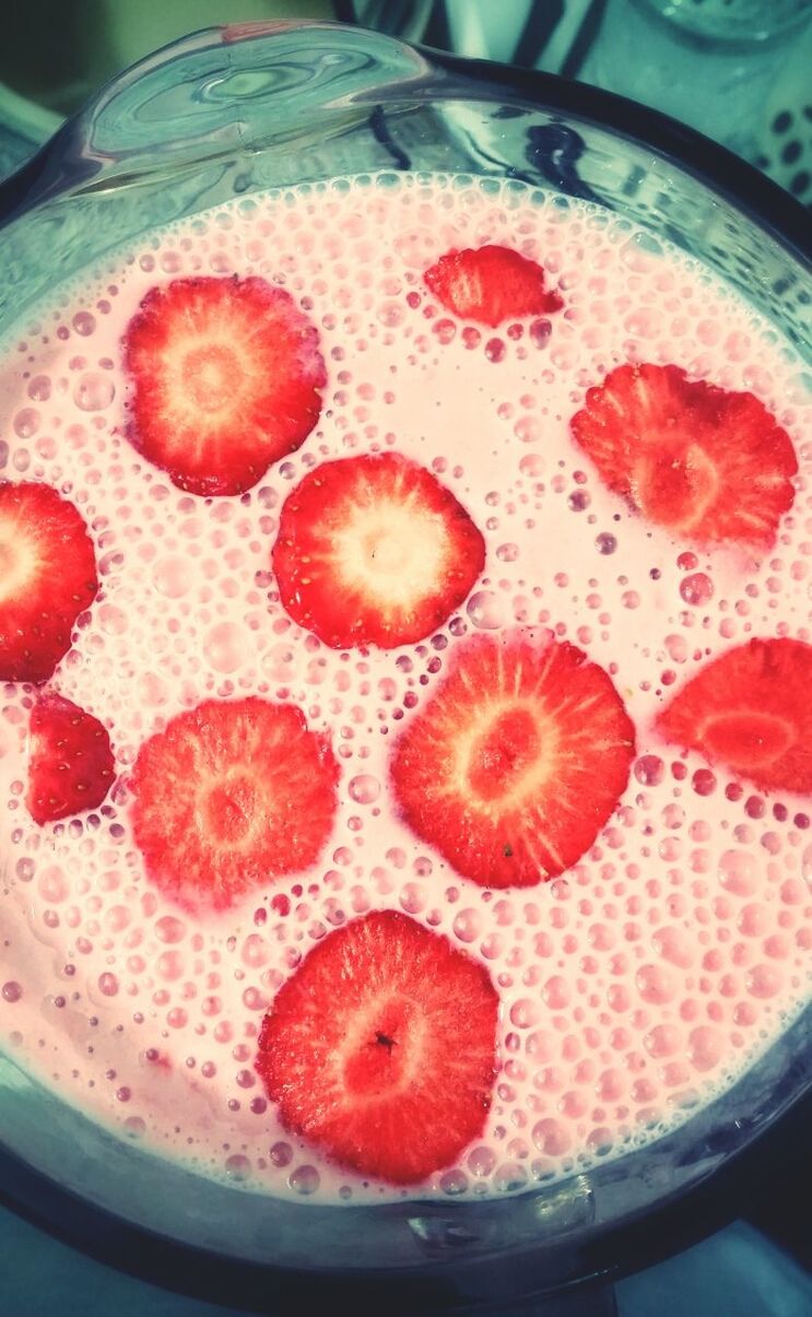 Close-up of a strawberry slices in juice