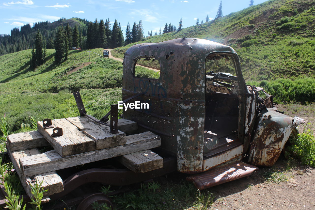 Abandoned truck on field