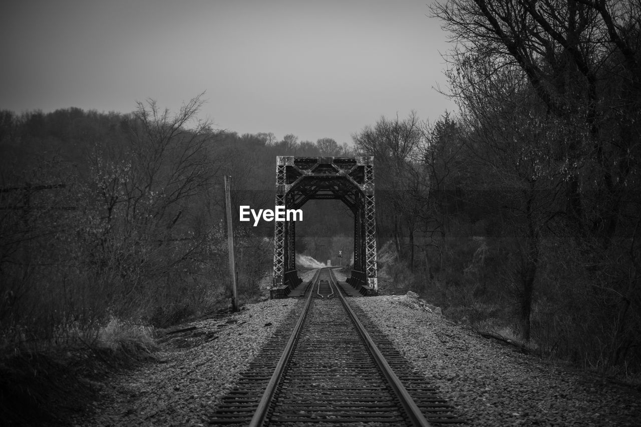 VIEW OF RAILROAD TRACKS ALONG PLANTS