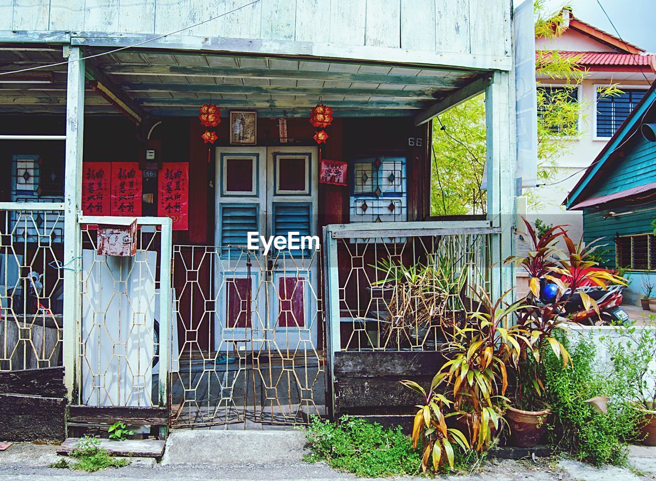 ABANDONED HOUSE AGAINST WALL