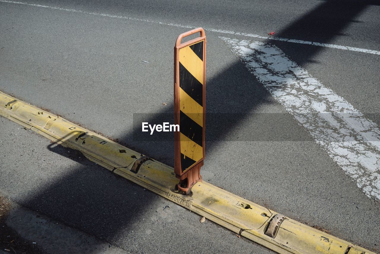 Close-up of white line on road