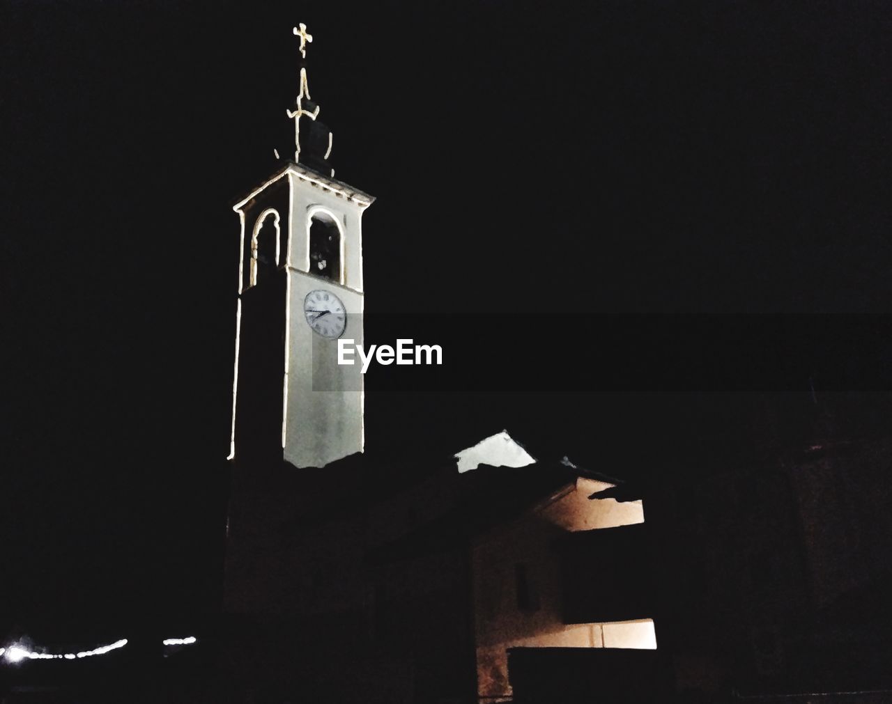 LOW ANGLE VIEW OF CHURCH WITH LIGHT