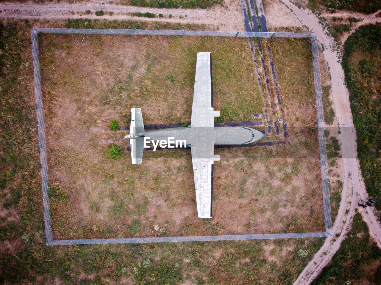 Aerial view of airplane on land