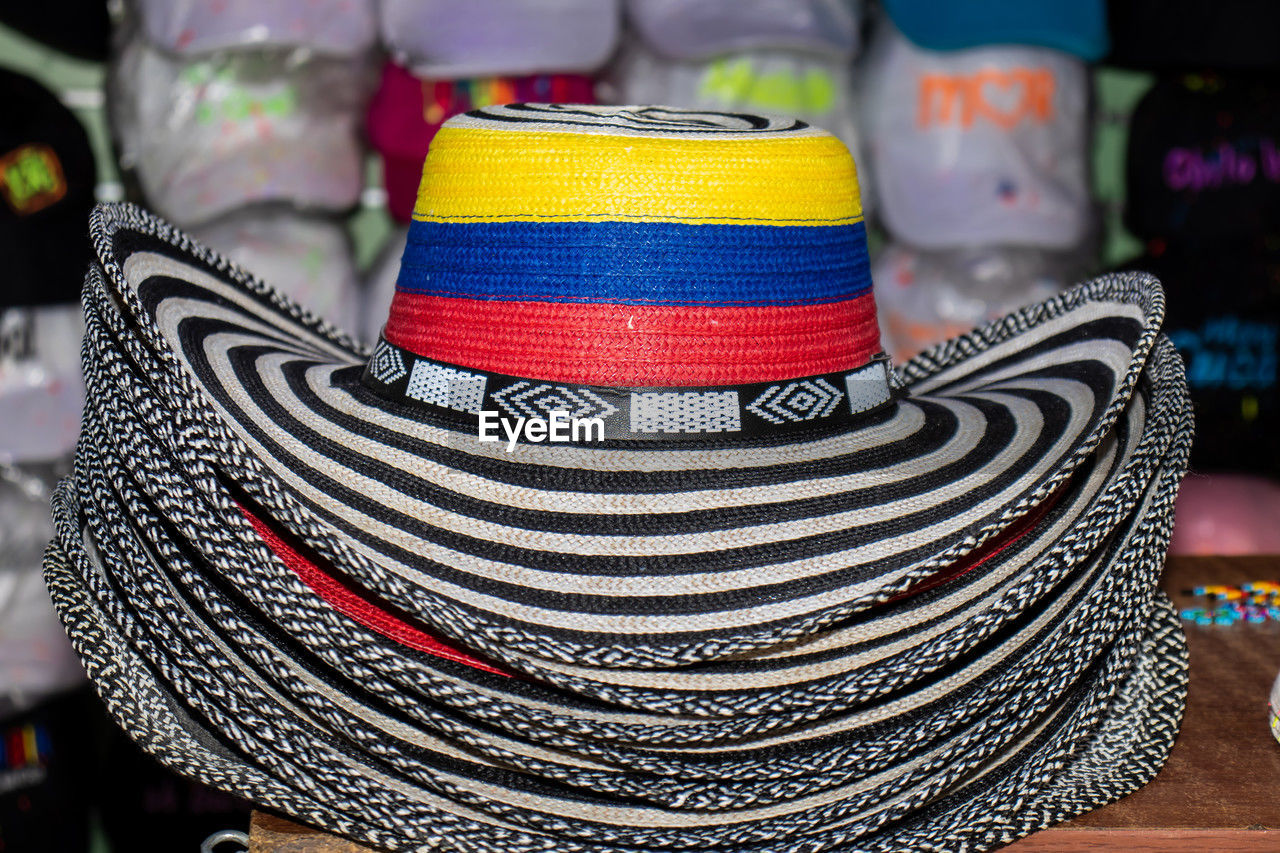Sell of traditional hats from colombia called sombrero vueltiao at the famous comuna 13 in medellin