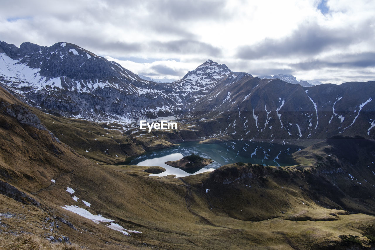 Scenic view of arid landscape during winter