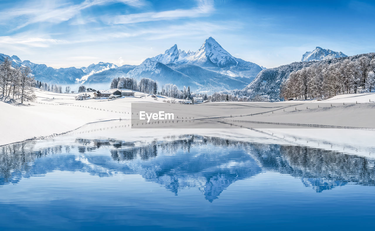 Scenic view of snowcapped mountains against sky