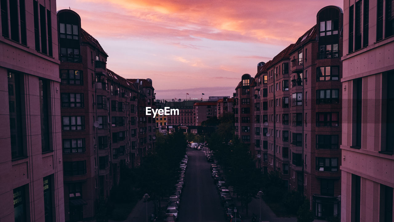 Panoramic view of city street against sky