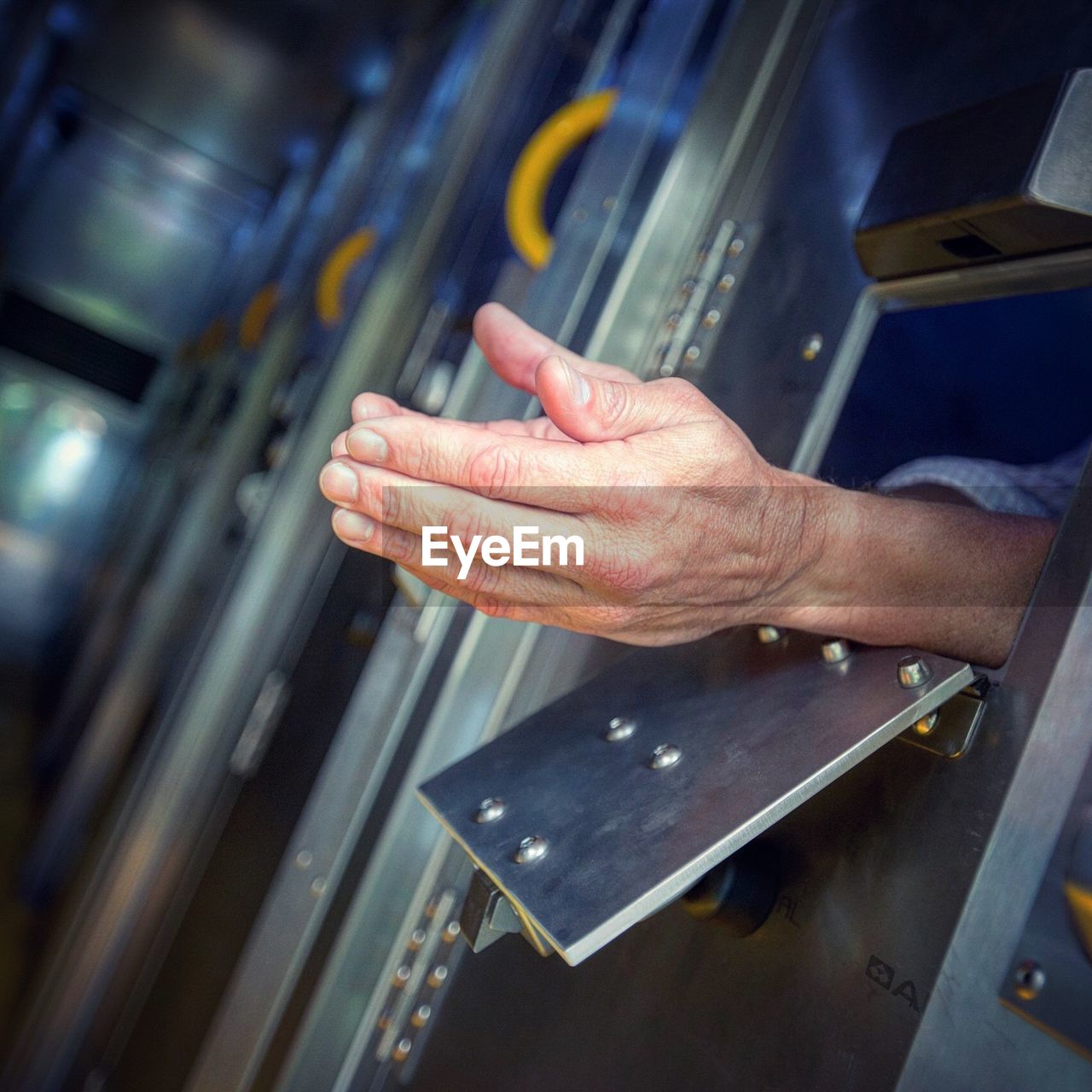 Cropped image of man in prison