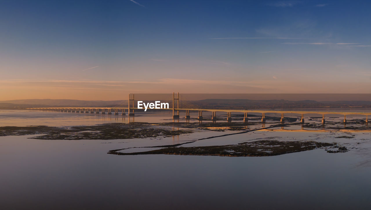 The severn bridge at sunset in gloucestershire, uk