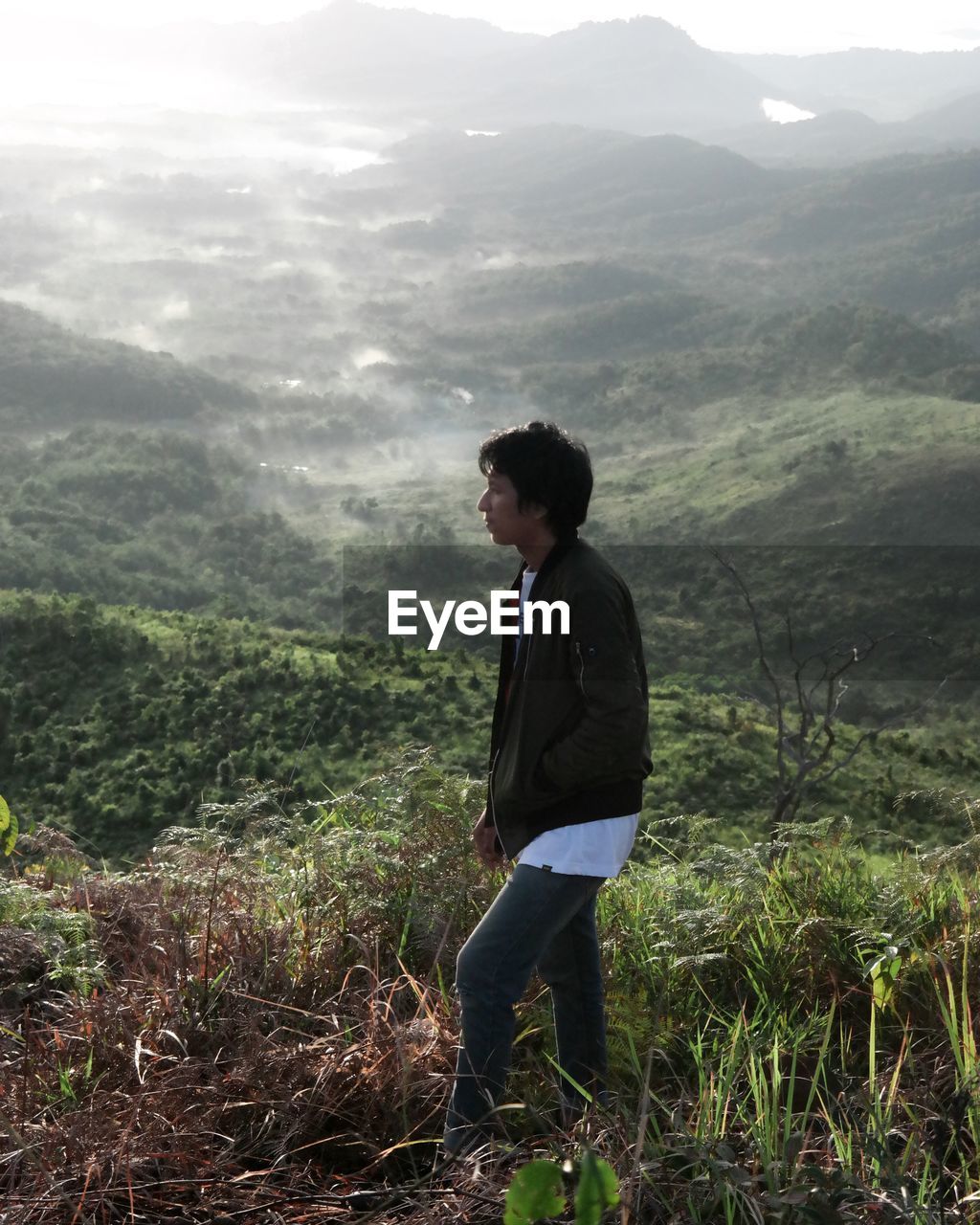High angle view of man standing on mountain