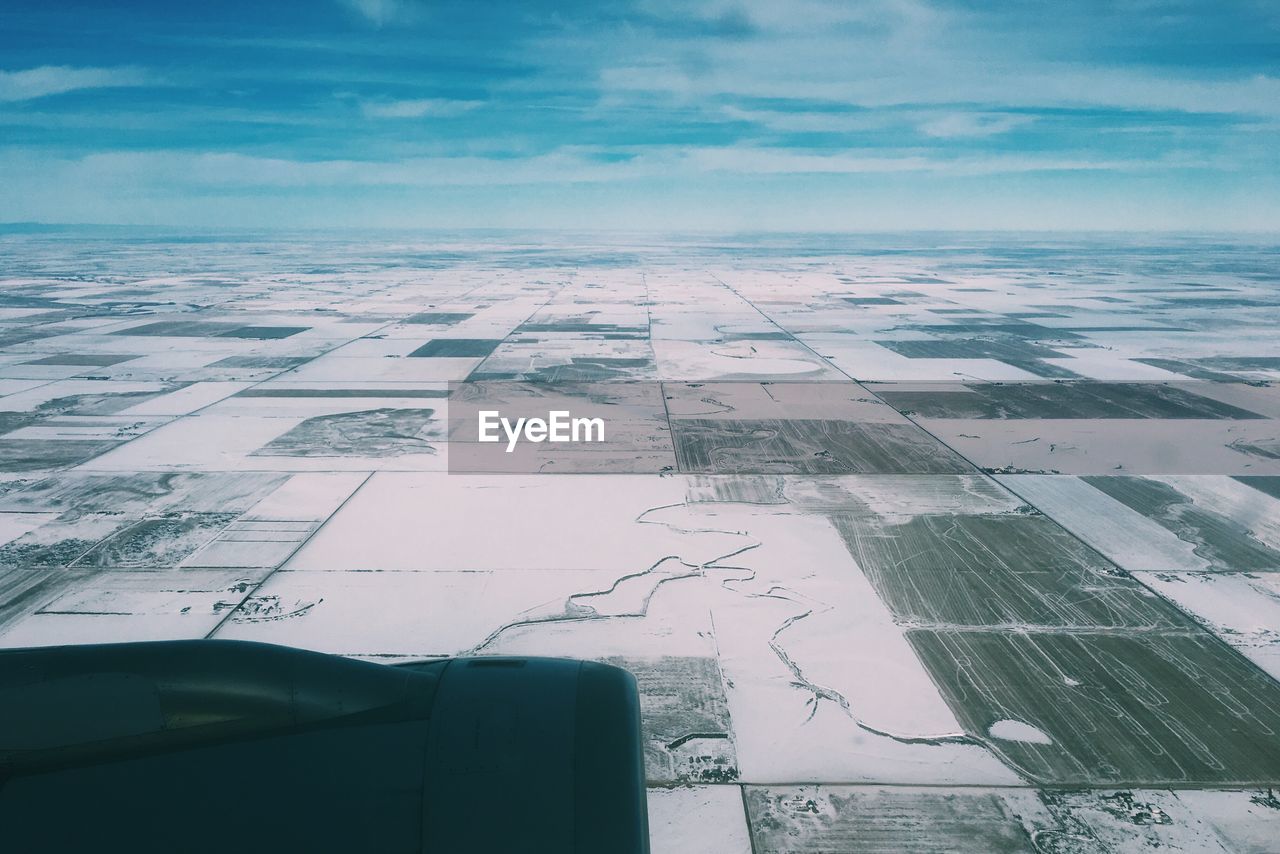 Aerial view of landscape seen from airplane window