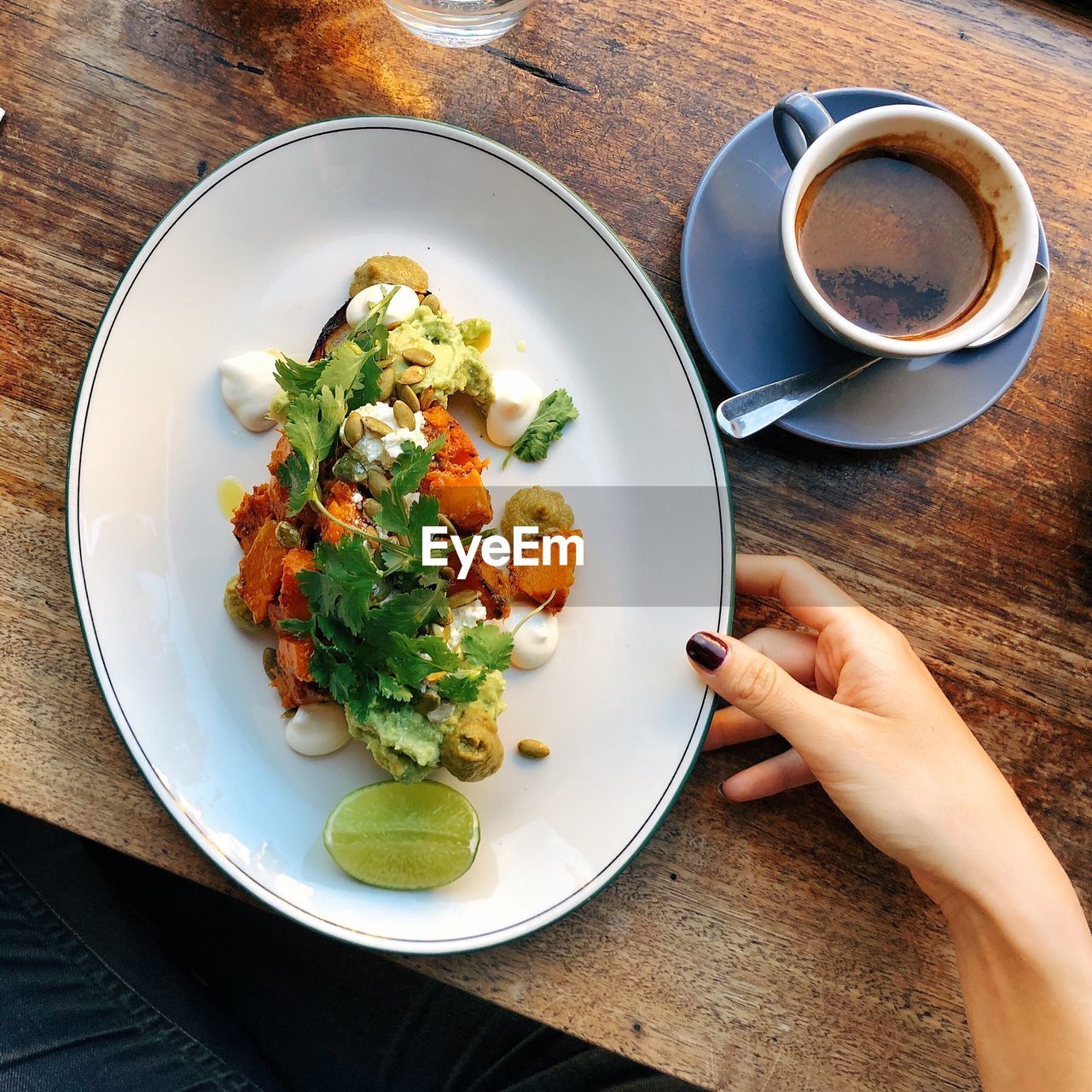 HIGH ANGLE VIEW OF BREAKFAST SERVED WITH COFFEE AND TABLE