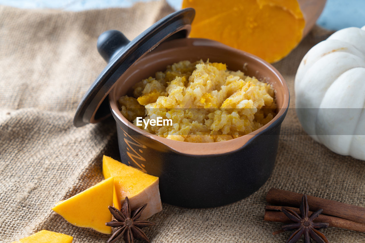food and drink, food, dish, bowl, healthy eating, wellbeing, spice, breakfast, produce, studio shot, no people, indoors, ingredient, freshness, snack, cuisine, meal, yellow