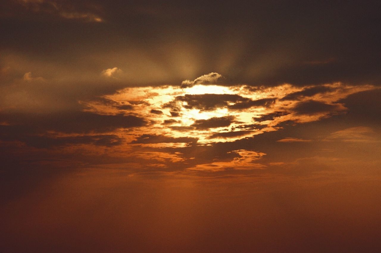 Scenic view of dramatic sky during sunset