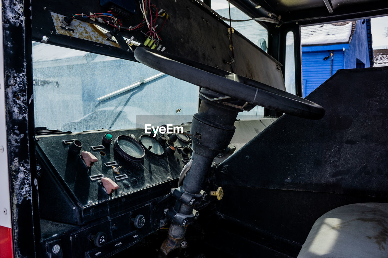 vehicle, screenshot, transportation, indoors, mode of transportation, day, architecture