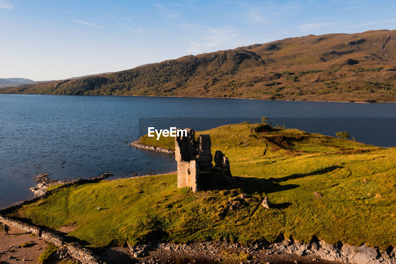 View of the ruined ardvreck castle over loch assynt, sutherland, north west highlands, scotland