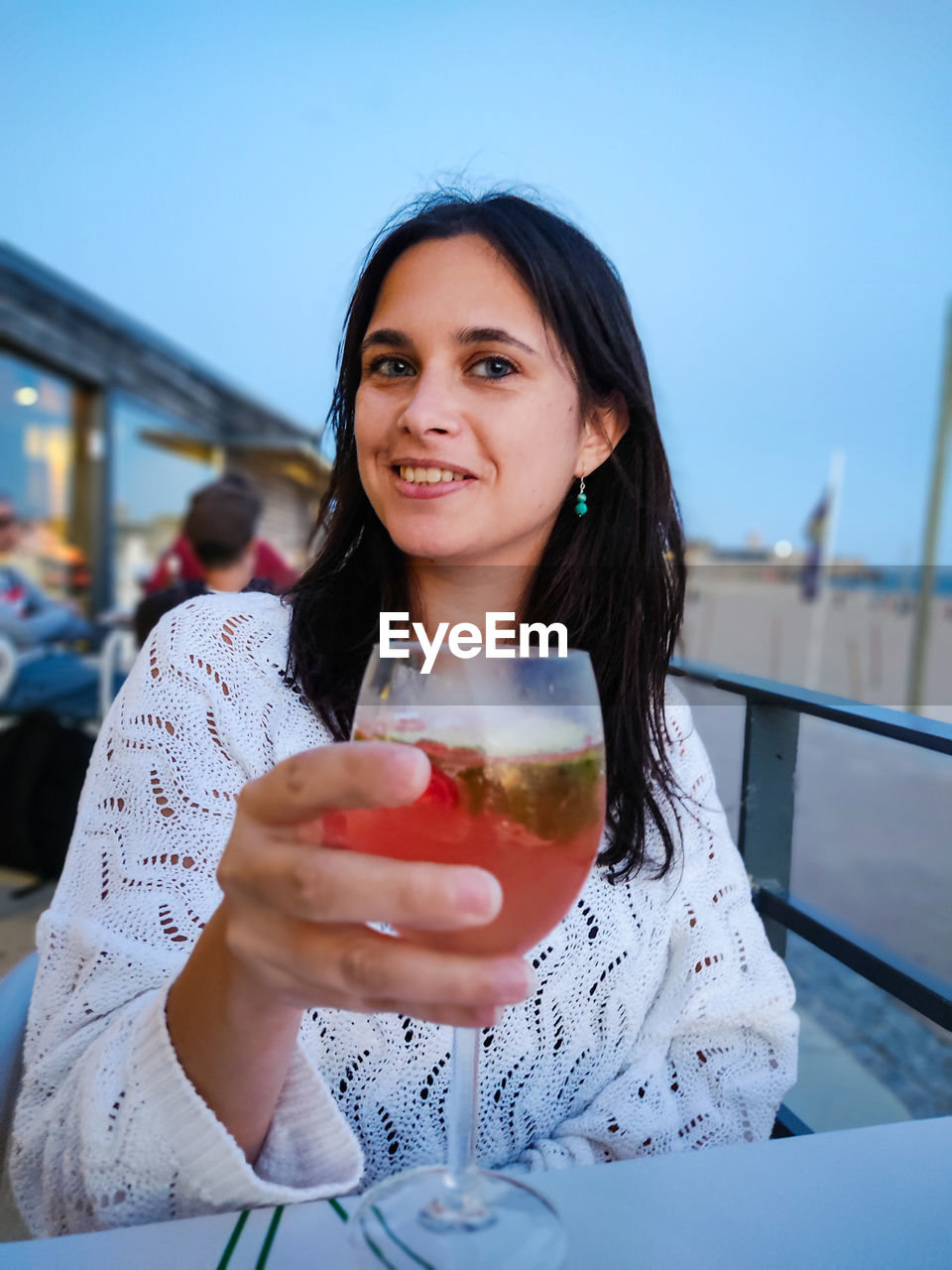 Portrait of woman with a glass of sangria