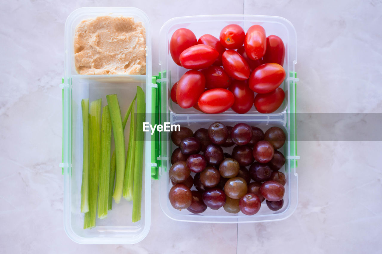 HIGH ANGLE VIEW OF FRUITS AND VEGETABLES ON TABLE