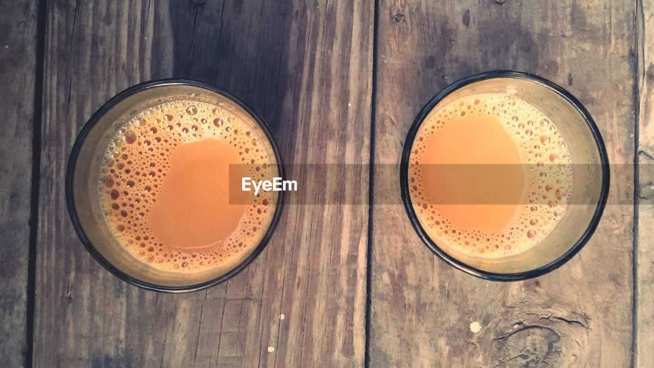 Directly above shot of tea in glasses on table