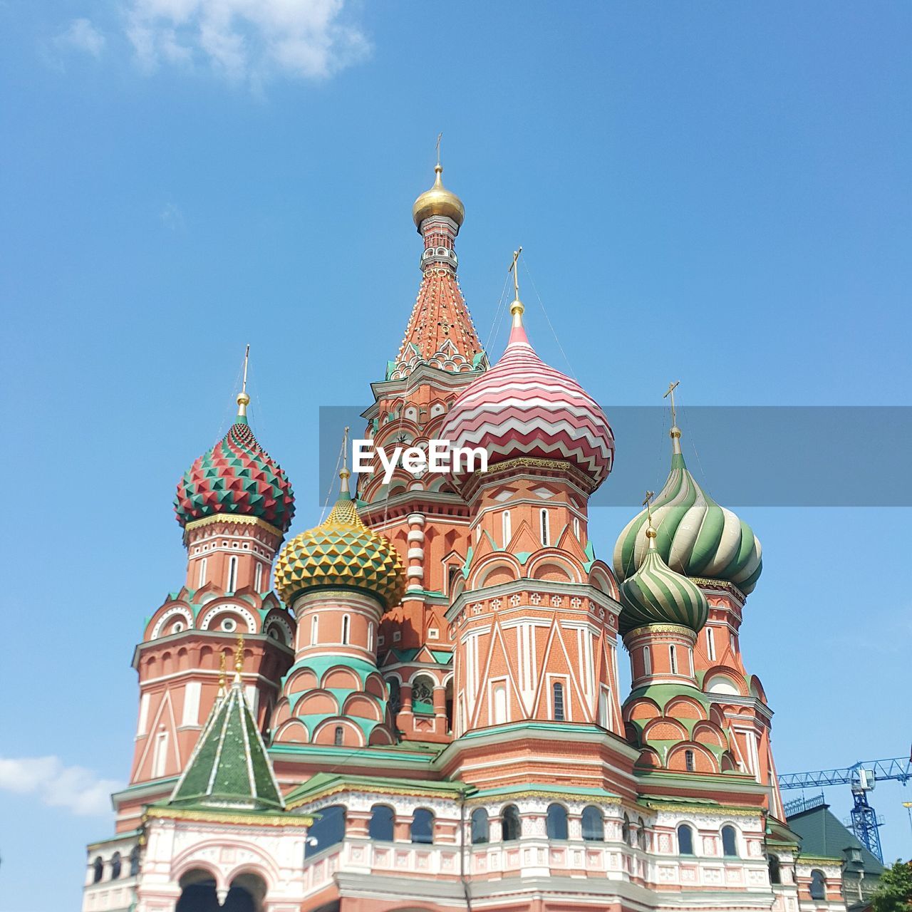 Low angle view of saint basil cathedral against blue sky