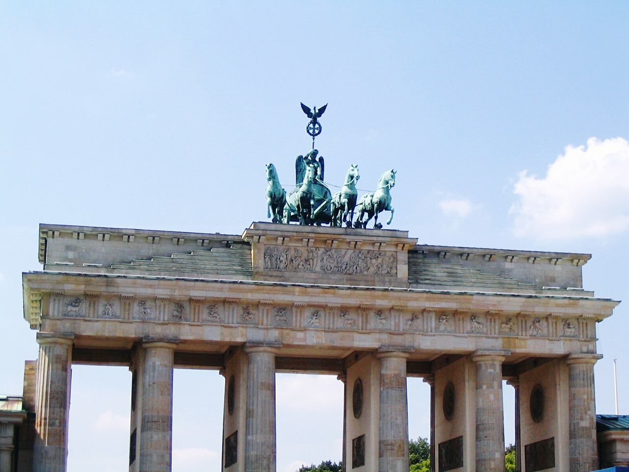 Statue in front of building