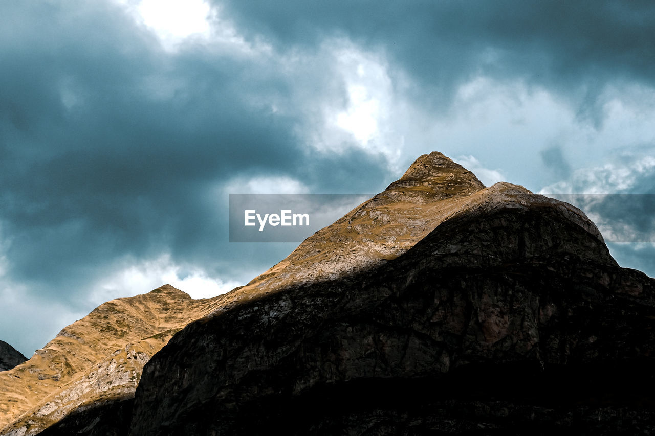 Low angle view of mountain against sky