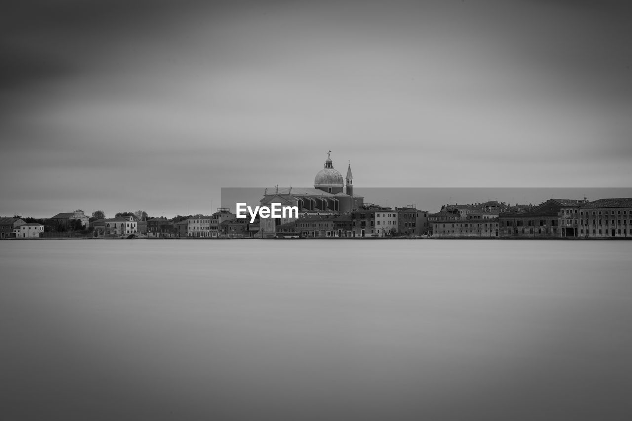 VIEW OF MOSQUE AT WATERFRONT