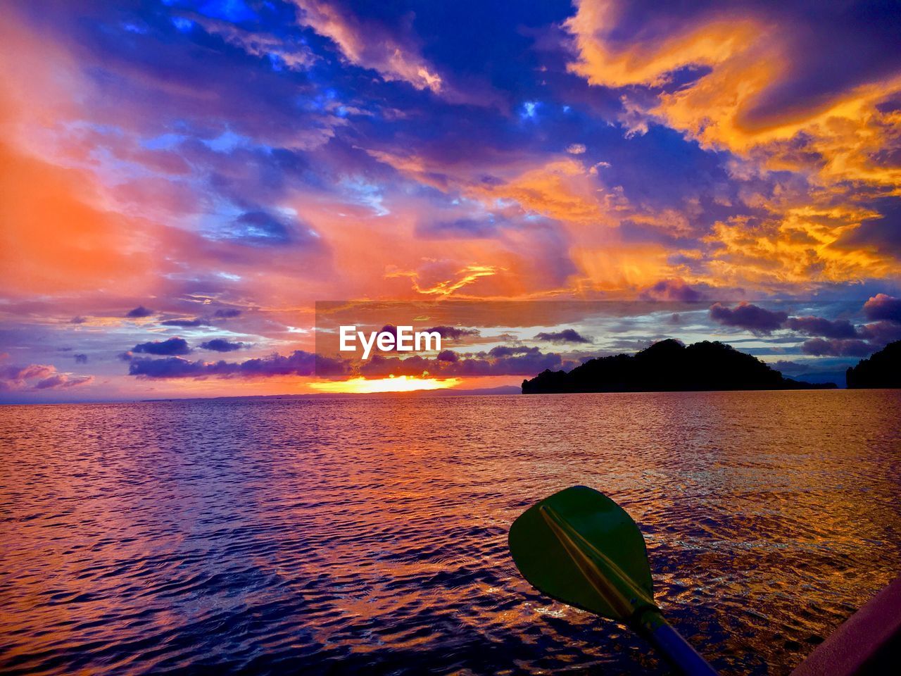 SCENIC VIEW OF SEA AGAINST ORANGE SKY