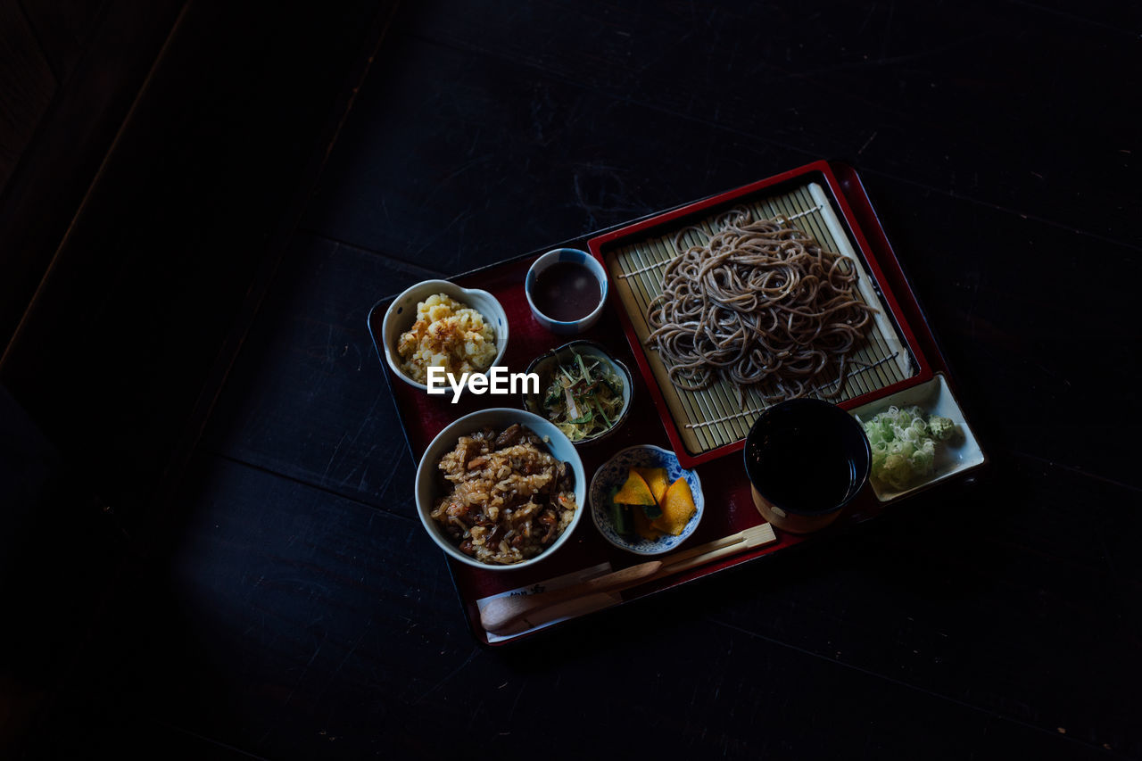 Saba set meal on table under dramatic lightning