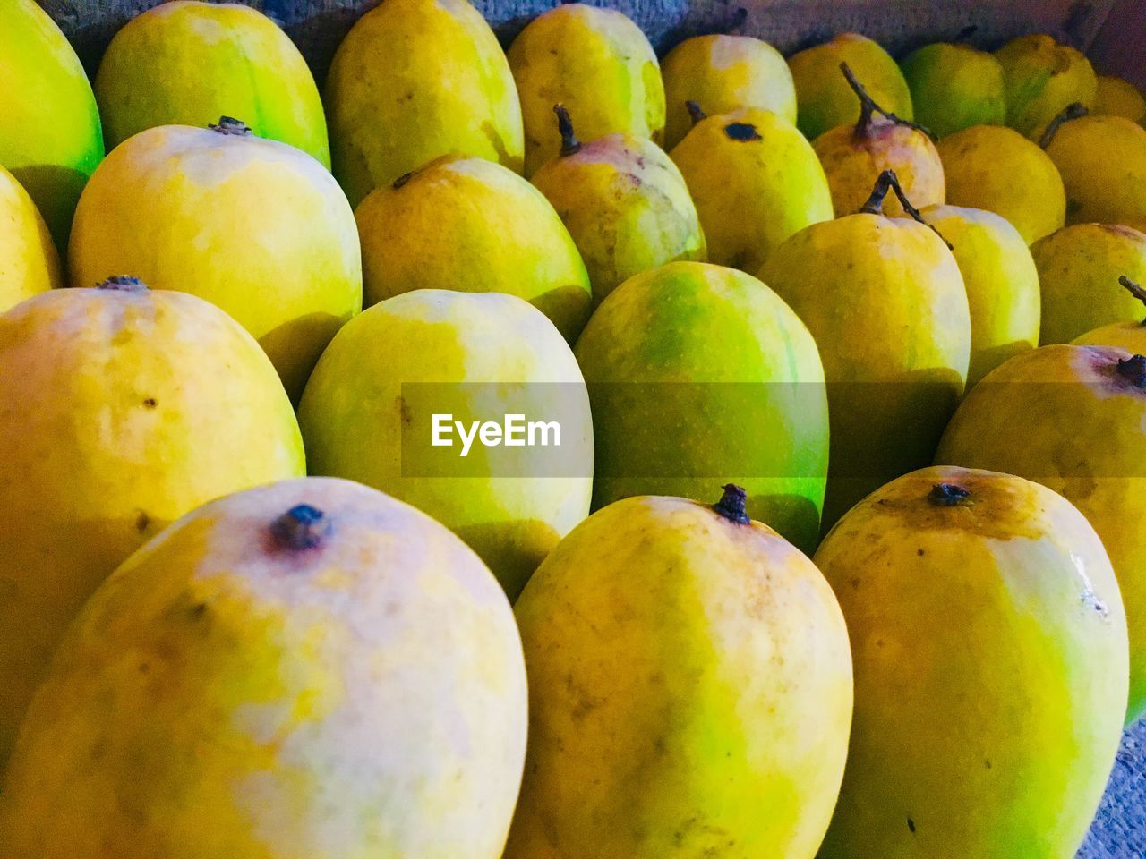 Full frame shot of mangos at the market