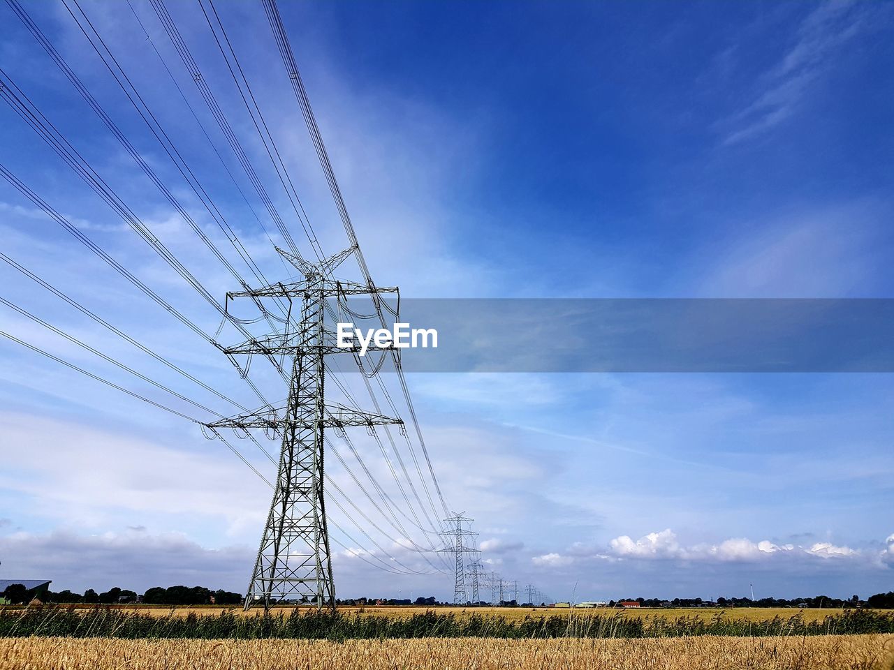 LOW ANGLE VIEW OF ELECTRICITY PYLON AGAINST SKY