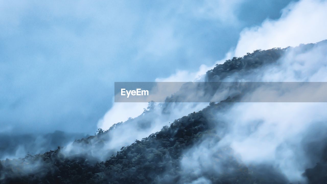 Low angle view of mountains against sky